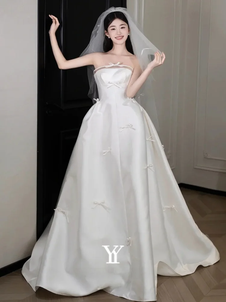 Elegant White Satin Wedding Dress 2026 New Style Bridal Gown for Women Sleeveless Floor Length Tail Korean Style Embroidery
Elegant White Satin Wedding Dress 2026 New Style Bridal Gown for Women Sleeveless Floor Length Tail Korean Style Embroidery