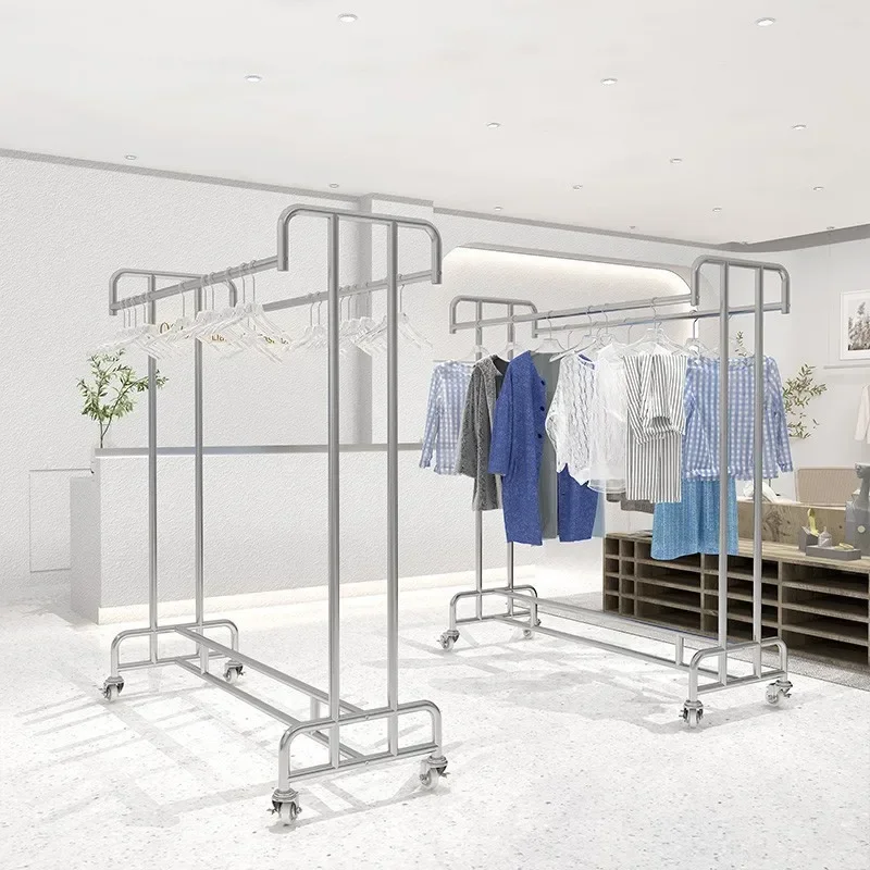 Classic Stainless steel clothing store display rack Floor shelf Double row parallel bar with wheel hanger
Classic Stainless steel clothing store display rack Floor shelf Double row parallel bar with wheel hanger