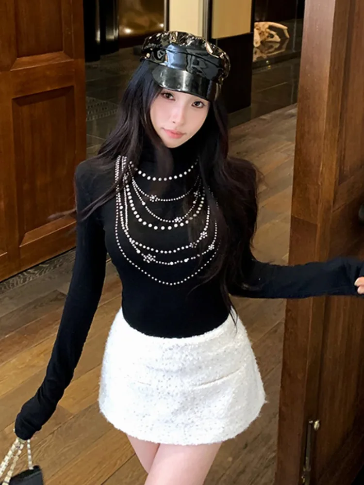 Black High Collar Pearl Chain T-Shirt Autumn Winter Design Slim Fit Base Shirt Sequin Skirt Set Women's Knittedwear
Black High Collar Pearl Chain T-Shirt Autumn Winter Design Slim Fit Base Shirt Sequin Skirt Set Women's Knittedwear