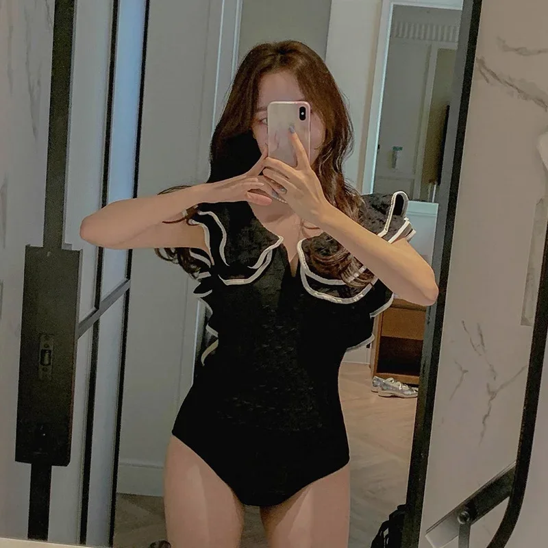 2024 Women One Piece Ruffle Swimwear Backless Swimsuit Black Bathing Suit Bodysuit Beachwear Korea Style 2024 new
2024 Women One Piece Ruffle Swimwear Backless Swimsuit Black Bathing Suit Bodysuit Beachwear Korea Style 2024 new