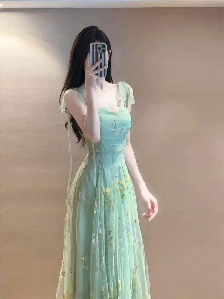 Green floral print tulle ethereal halter dress for coming-of-age ceremony
Green floral print tulle ethereal halter dress for coming-of-age ceremony