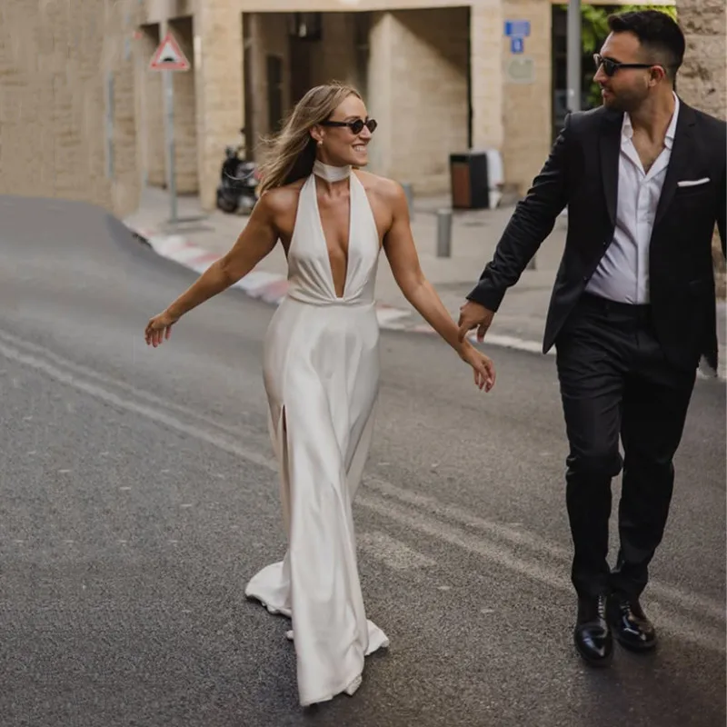 Simple Satin Mermaid Long Wedding Dress Sleeveless Sexy Halter Formal Pleated Deep V-Neck Backless High Slit Growns Customized
Simple Satin Mermaid Long Wedding Dress Sleeveless Sexy Halter Formal Pleated Deep V-Neck Backless High Slit Growns Customized