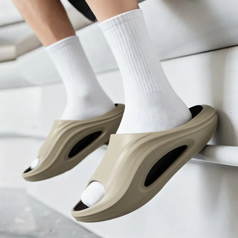 Men's slippers for summer outdoor wear trend anti slip 2026 new indoor home EVA thick soled sports slippers for men
Men's slippers for summer outdoor wear trend anti slip 2026 new indoor home EVA thick soled sports slippers for men