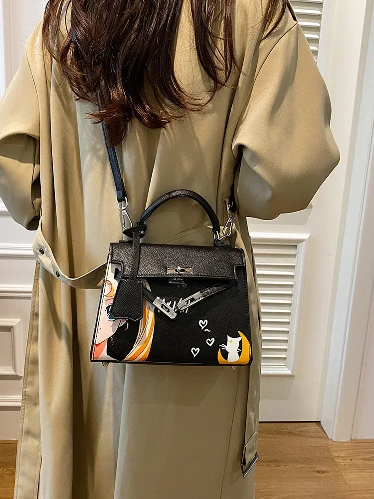 2025 New! Niche Kelly-Style Bag - Painted Cartoon, Multi-Carry for Girls, Street Fashion
2025 New! Niche Kelly-Style Bag - Painted Cartoon, Multi-Carry for Girls, Street Fashion