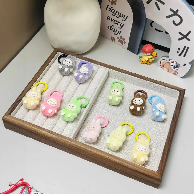 Mini Flocking Labubu Keychain Cartoon Cute Three-dimensional Doll Backpacks Decoration Pendant Car Key Chain Women and Men Gifts
Mini Flocking Labubu Keychain Cartoon Cute Three-dimensional Doll Backpacks Decoration Pendant Car Key Chain Women and Men Gifts