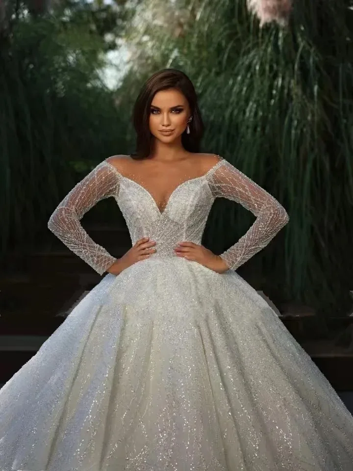 OL Customized Beading V-Neck Ball Gown Wedding Dresess Luxury Glitter Long Sleeve Lace Princess Bridal Dress Vestido De Noiva
OL Customized Beading V-Neck Ball Gown Wedding Dresess Luxury Glitter Long Sleeve Lace Princess Bridal Dress Vestido De Noiva