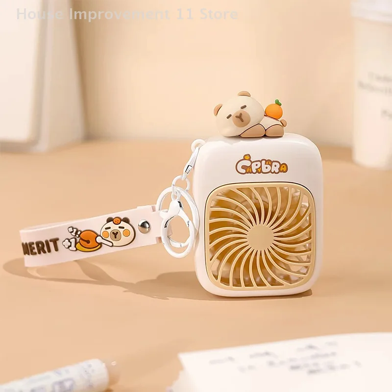 2025 Cute Capybara Mini Portable Fan Handheld Small Fan Charging 3-speed Handheld Fan Suitable For Office Outdoor Travel
2025 Cute Capybara Mini Portable Fan Handheld Small Fan Charging 3-speed Handheld Fan Suitable For Office Outdoor Travel
