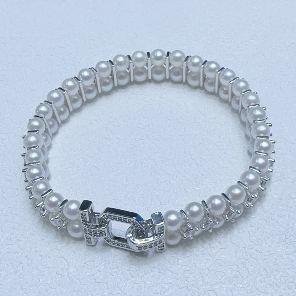 Bright Luster 4-5mm Freshwater Akoya Pearl Double Layer Bracelet Jewelry with 925 Sterling Silver Clasp and Sparkling Zircon
Bright Luster 4-5mm Freshwater Akoya Pearl Double Layer Bracelet Jewelry with 925 Sterling Silver Clasp and Sparkling Zircon