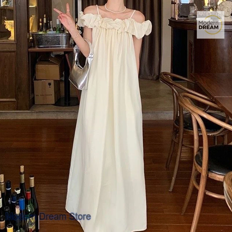 French off-the-shoulder sling dress for women's summer new relaxed temperament holiday retro slim design sense long skirt
French off-the-shoulder sling dress for women's summer new relaxed temperament holiday retro slim design sense long skirt