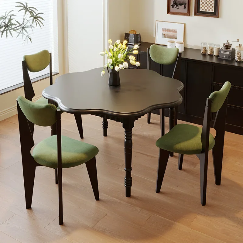 Solid wood dining table, small household one table and four chairs, retro style, round medieval dining table
Solid wood dining table, small household one table and four chairs, retro style, round medieval dining table