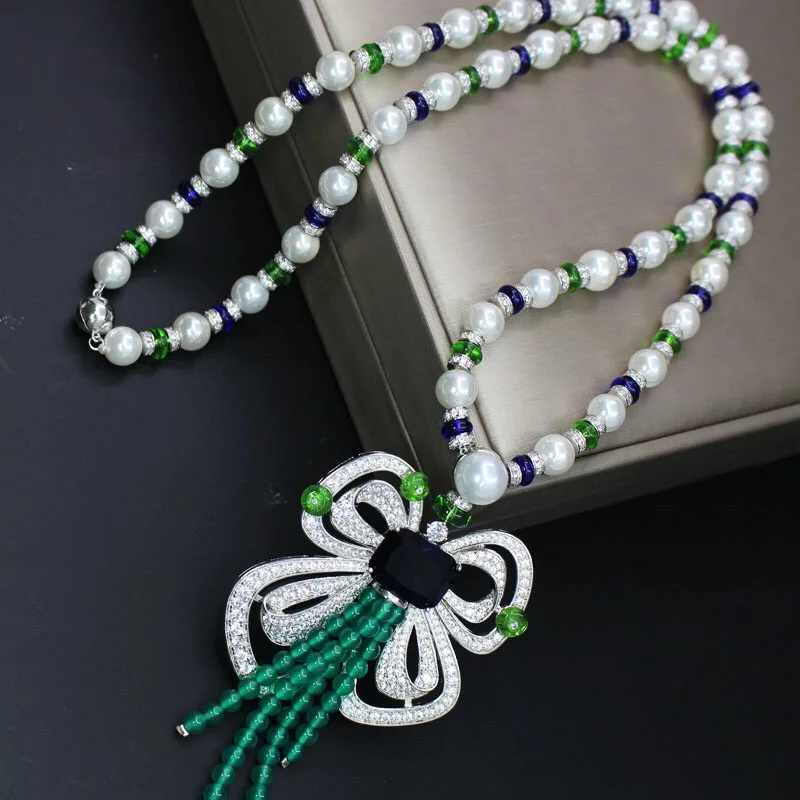 Europe America Fashion Style Women Lady Inlay Czech Zircon Tassels Bowknot Pendant Synthetic White Pearl Chain Long Necklace
Europe America Fashion Style Women Lady Inlay Czech Zircon Tassels Bowknot Pendant Synthetic White Pearl Chain Long Necklace