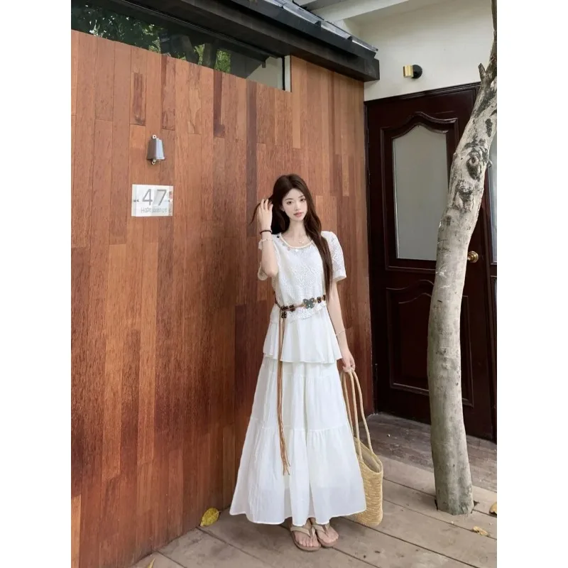 Women's Boho Hollow Out Knit Cover Up Top Tiered Maxi Skirt 2 Piece Summer Outfit Set
Women's Boho Hollow Out Knit Cover Up Top Tiered Maxi Skirt 2 Piece Summer Outfit Set
