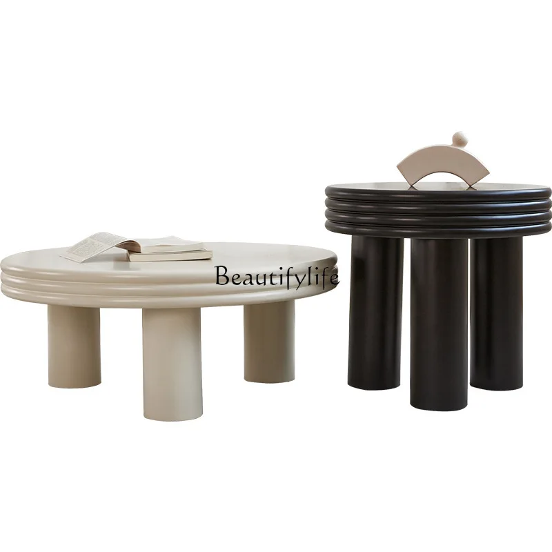 Cream wind round coffee table modern simple wabi sandy wind high and low coffee table combination
Cream wind round coffee table modern simple wabi sandy wind high and low coffee table combination