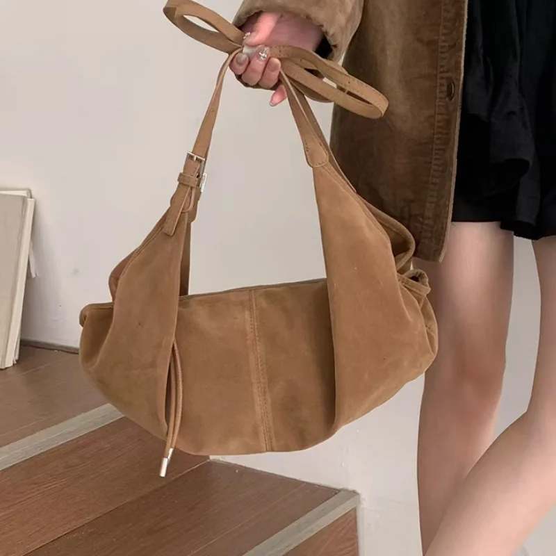 Korean Retro Suede Women' Shoulder Bag New Stylish Double Shoulder Strap Handbag Versatile Large Capacity Commuter Crossbody Bag
Korean Retro Suede Women' Shoulder Bag New Stylish Double Shoulder Strap Handbag Versatile Large Capacity Commuter Crossbody Bag