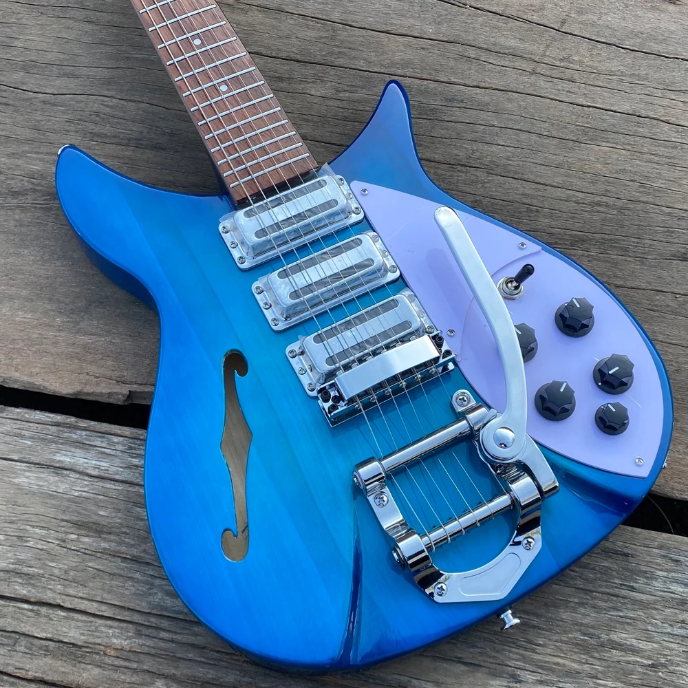 325 Electric Guitar Blue F-hole Semi Hollow Body, Stainless Steel Frets, Tremolo Bridge, 3 Mini Humbuckers, 20.75" Scale Length
325 Electric Guitar Blue F-hole Semi Hollow Body, Stainless Steel Frets, Tremolo Bridge, 3 Mini Humbuckers, 20.75" Scale Length