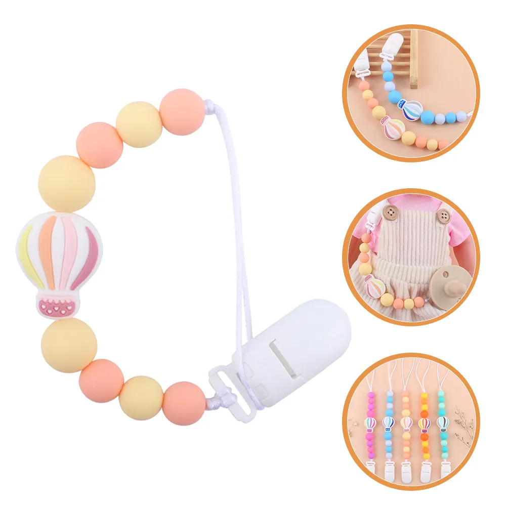 Держатель для соски с силиконовыми бусинами-прорезывателями, нейтральный дизайн, мультяшный рисунок, в виде воздушного шара, прочный и практичный
Держатель для соски с силиконовыми бусинами-прорезывателями, нейтральный дизайн, мультяшный рисунок, в виде воздушного шара, прочный и практичный