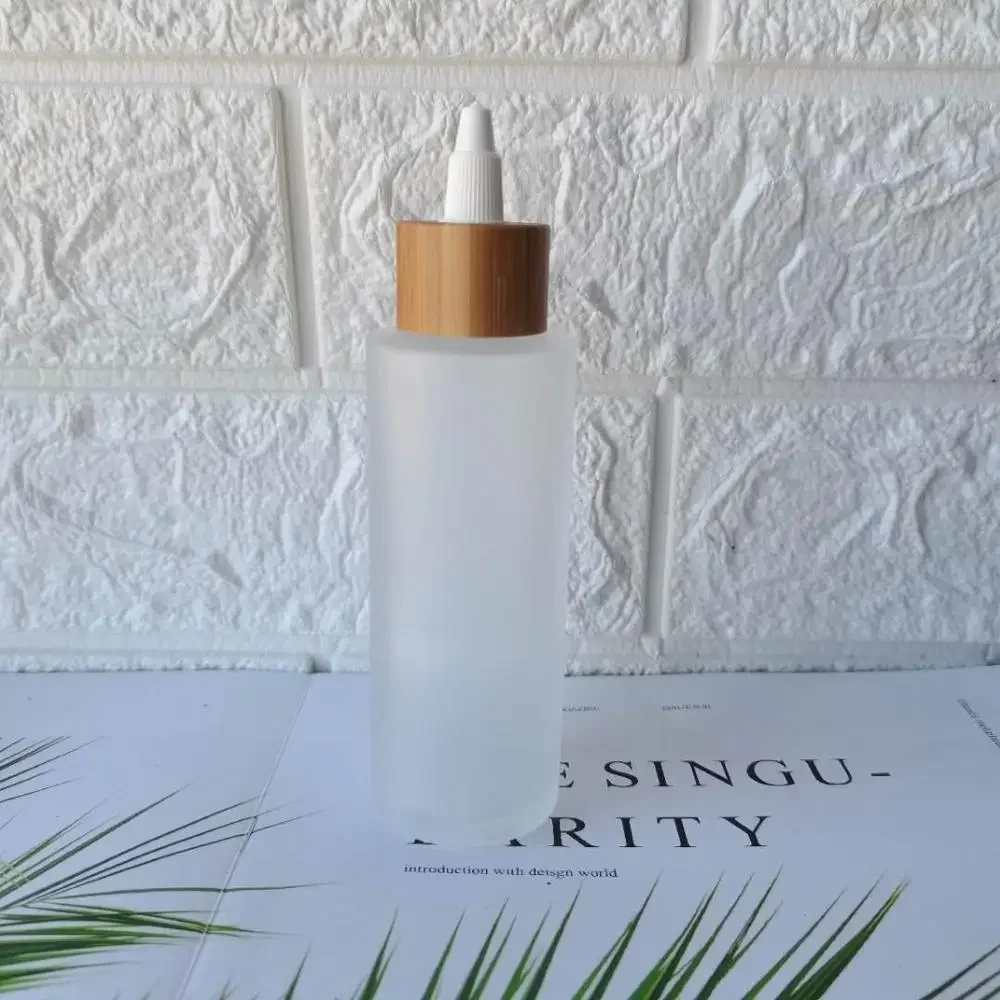 Wholesale Custom logo Frosted Clear Glass Cream Jar Cosmetic Bottle With Bamboo Wood Lid Skin Care Container Packaging bottle
Wholesale Custom logo Frosted Clear Glass Cream Jar Cosmetic Bottle With Bamboo Wood Lid Skin Care Container Packaging bottle