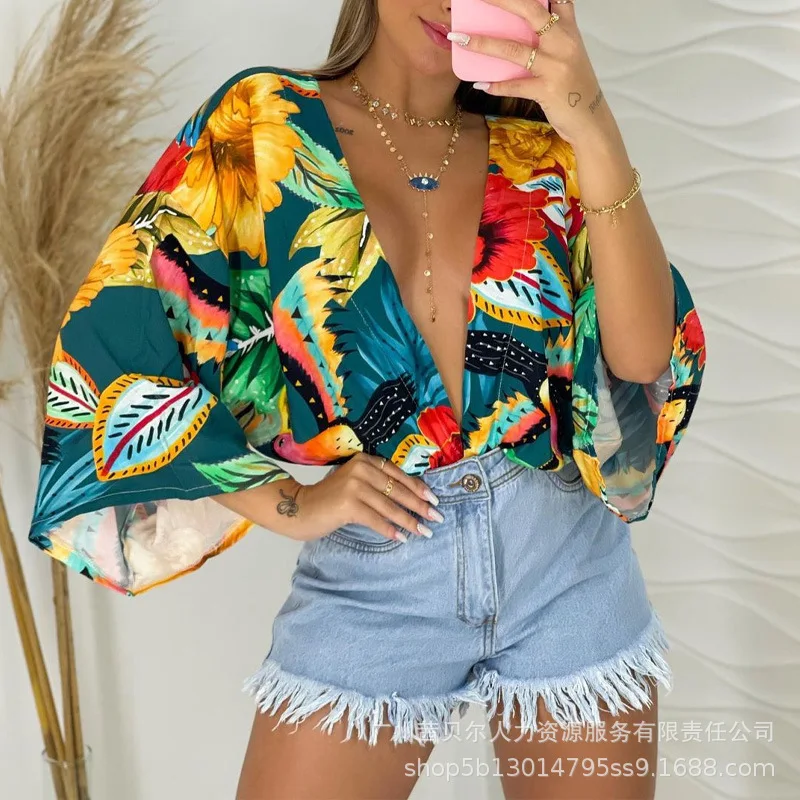 Women's colorful printed V-neck bat sleeve top, fashionable and casual, new women's clothing for spring and summer 2025
Women's colorful printed V-neck bat sleeve top, fashionable and casual, new women's clothing for spring and summer 2025