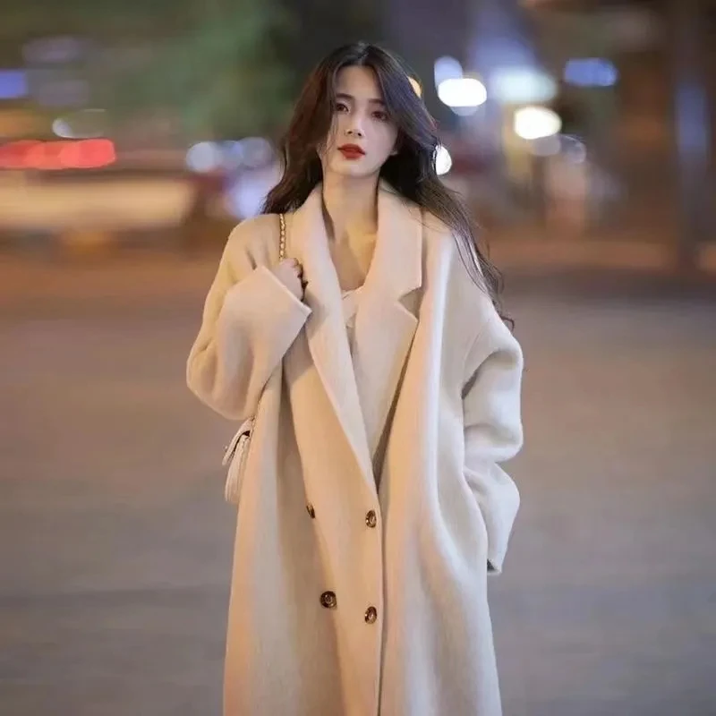 Autumn and winter long warm ladies double breasted wool blend coat thick beige elegant new coat
Autumn and winter long warm ladies double breasted wool blend coat thick beige elegant new coat