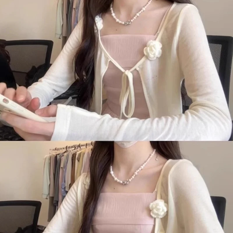 White Knitted Ice Silk Belted Cardigan Women's Early Spring 2026 New Sle Casual Loose Fit Long Sve ort Coat Top
White Knitted Ice Silk Belted Cardigan Women's Early Spring 2026 New Sle Casual Loose Fit Long Sve ort Coat Top