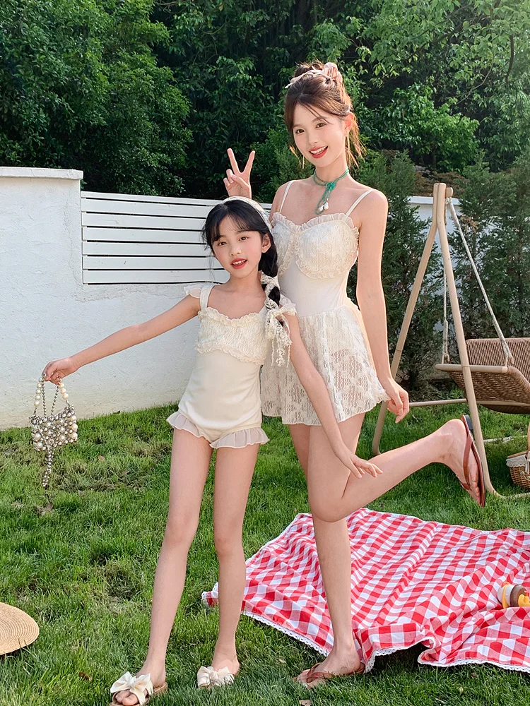 White Parent-Child Swimsuit Long Sleeve One-Piece Cover-Up Slimming High-End Feelings for Small Children And Girls
White Parent-Child Swimsuit Long Sleeve One-Piece Cover-Up Slimming High-End Feelings for Small Children And Girls