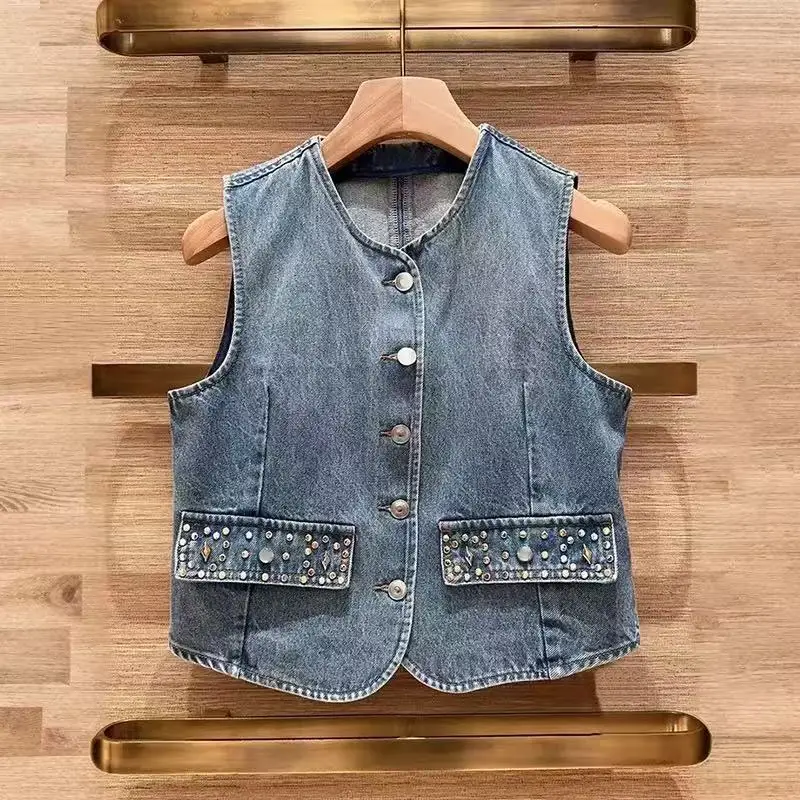 Spring 2026 round Neck Denim Vest Women's Fashion Commute Style Washed Jeans Decorative Rivet Top Cotton Material Sleeveless
Spring 2026 round Neck Denim Vest Women's Fashion Commute Style Washed Jeans Decorative Rivet Top Cotton Material Sleeveless