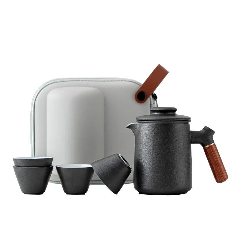 High-end portable travel ceramic tea set, one pot and four cups gift set.
High-end portable travel ceramic tea set, one pot and four cups gift set.