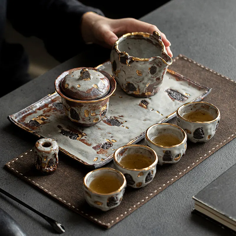 Kung Fu tea set is all handmade, covered bowl, fair cup, teacup, wabi sandy wind, simple retro style
Kung Fu tea set is all handmade, covered bowl, fair cup, teacup, wabi sandy wind, simple retro style