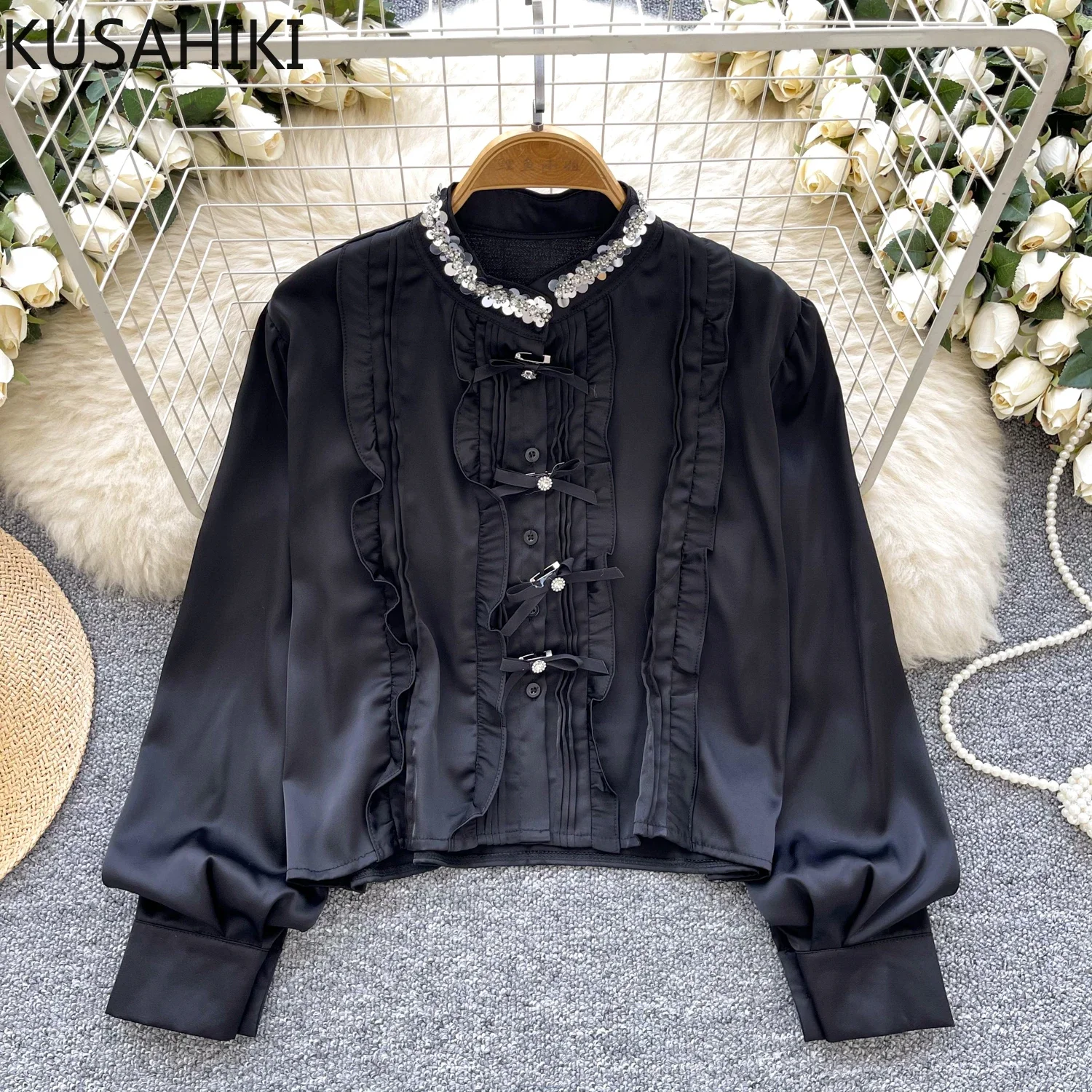 KUSAHIKI French Sequin Stand Up Collar Long Sleeved Satin Shirt for Women with Ruffle Splicing Single Breasted Versatile Top
KUSAHIKI French Sequin Stand Up Collar Long Sleeved Satin Shirt for Women with Ruffle Splicing Single Breasted Versatile Top
