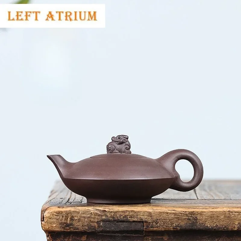 180ml Antique Yixing Purple Clay Teapots Handmade Beast Pot Raw Ore Purple Mud Kettle With Strainer Zisha Teaset Gift
180ml Antique Yixing Purple Clay Teapots Handmade Beast Pot Raw Ore Purple Mud Kettle With Strainer Zisha Teaset Gift