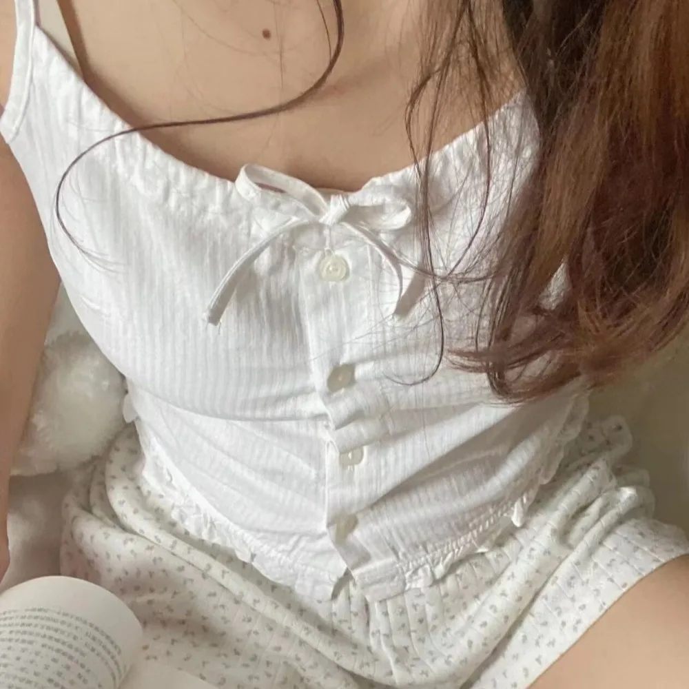 Simple Lace Up Y2k Slim Crop Top Ruffle Bow Women's Button Vest Top Korean Style Sweet Sleeveless Camisole Girl
Simple Lace Up Y2k Slim Crop Top Ruffle Bow Women's Button Vest Top Korean Style Sweet Sleeveless Camisole Girl