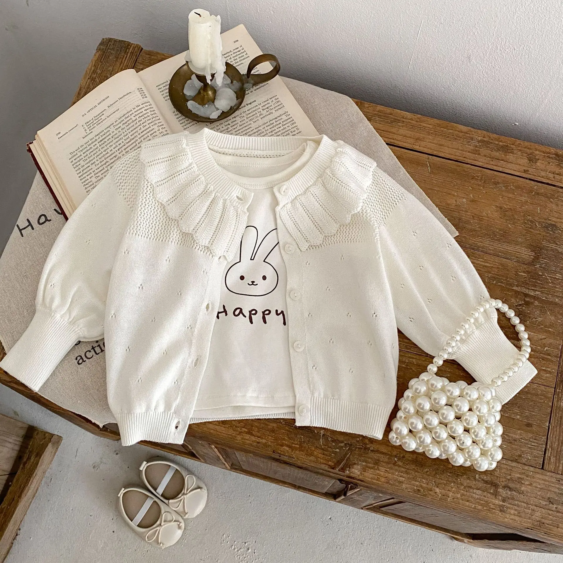 Autumn New Baby 0-3 Year Old Girl Fashion Lotus Collar Hollow Knitted Thin Coat Versatile Knitted Cardigan Top
Autumn New Baby 0-3 Year Old Girl Fashion Lotus Collar Hollow Knitted Thin Coat Versatile Knitted Cardigan Top