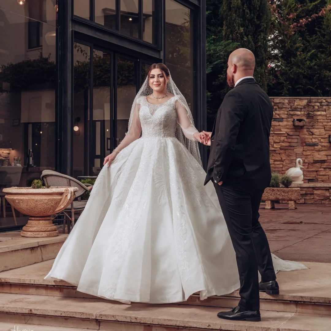 Custom Vestido De Novia Long Sleeve Lace Ball Gown Wedding Dress 2026 High Neck Spark Tulle Plus Size Chapel Train Bridal Gown
Custom Vestido De Novia Long Sleeve Lace Ball Gown Wedding Dress 2026 High Neck Spark Tulle Plus Size Chapel Train Bridal Gown