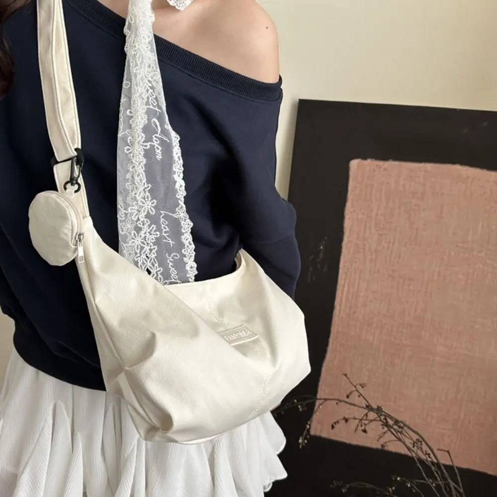 Korean Style Lightweight Shoulder Bag Large Capacity Cream Color Canvas Bag with Coin Purse Solid Color Messenger Bag
Korean Style Lightweight Shoulder Bag Large Capacity Cream Color Canvas Bag with Coin Purse Solid Color Messenger Bag