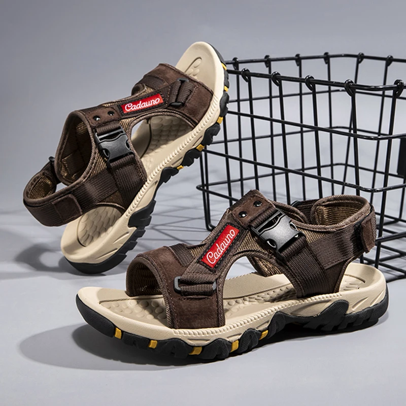 Модные мужские сандалии, летние мягкие пляжные удобные кожаные сандалии, уличные мужские римские сандалии, классические нескользящие кроссовки на плоской подошве
Модные мужские сандалии, летние мягкие пляжные удобные кожаные сандалии, уличные мужские римские сандалии, классические нескользящие кроссовки на плоской подошве