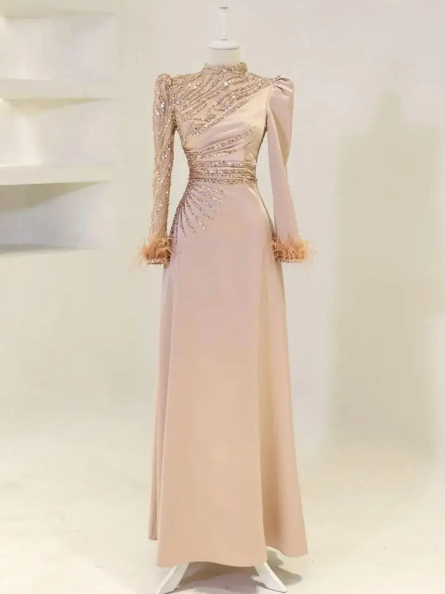 Мусульманское атласное вечернее платье в хиджабе с бисером по индивидуальному заказу, вечернее платье с длинными рукавами для выпускного вечера, перья, Дубай, исламские халаты De Soirée
Мусульманское атласное вечернее платье в хиджабе с бисером по индивидуальному заказу, вечернее платье с длинными рукавами для выпускного вечера, перья, Дубай, исламские халаты De Soirée