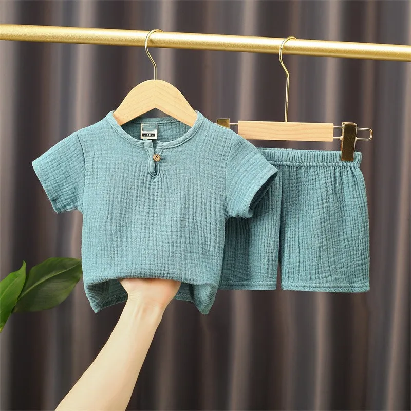 Children's Clothing Boys Girls Baby Short Sleeved Summer Set Children's Cotton Linen Button Short Sleeved T-shirt Shorts 2PCS
Children's Clothing Boys Girls Baby Short Sleeved Summer Set Children's Cotton Linen Button Short Sleeved T-shirt Shorts 2PCS