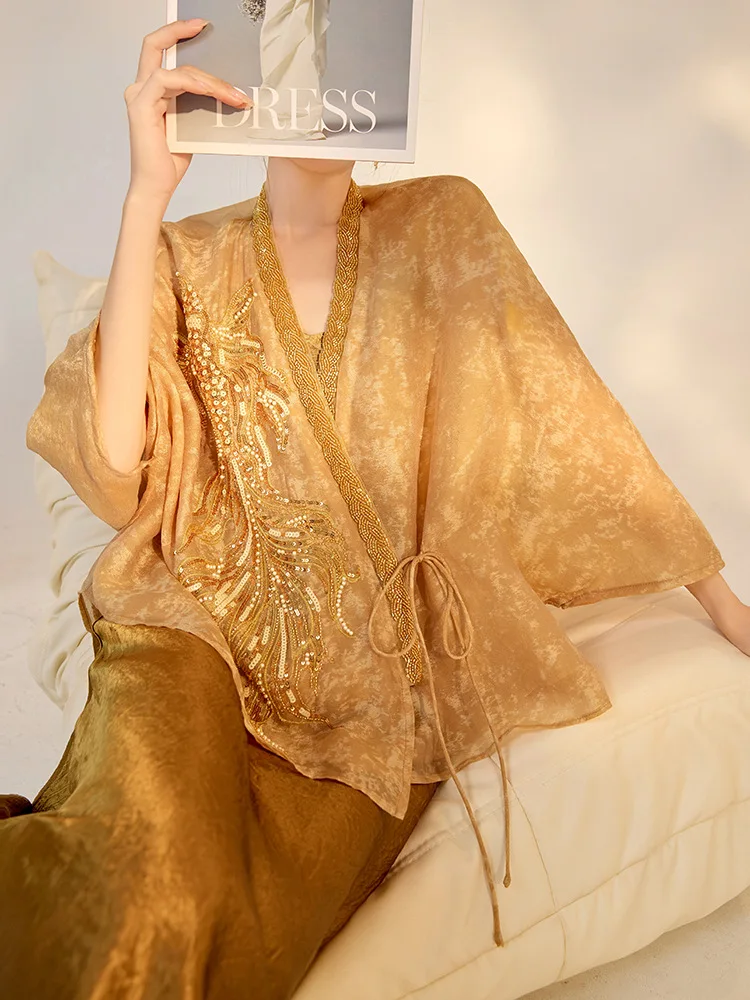 2026 New Chinese Style High-end Design with Embroidered Beads Light Luxury Gold Silk Loose Top for Women
2026 New Chinese Style High-end Design with Embroidered Beads Light Luxury Gold Silk Loose Top for Women