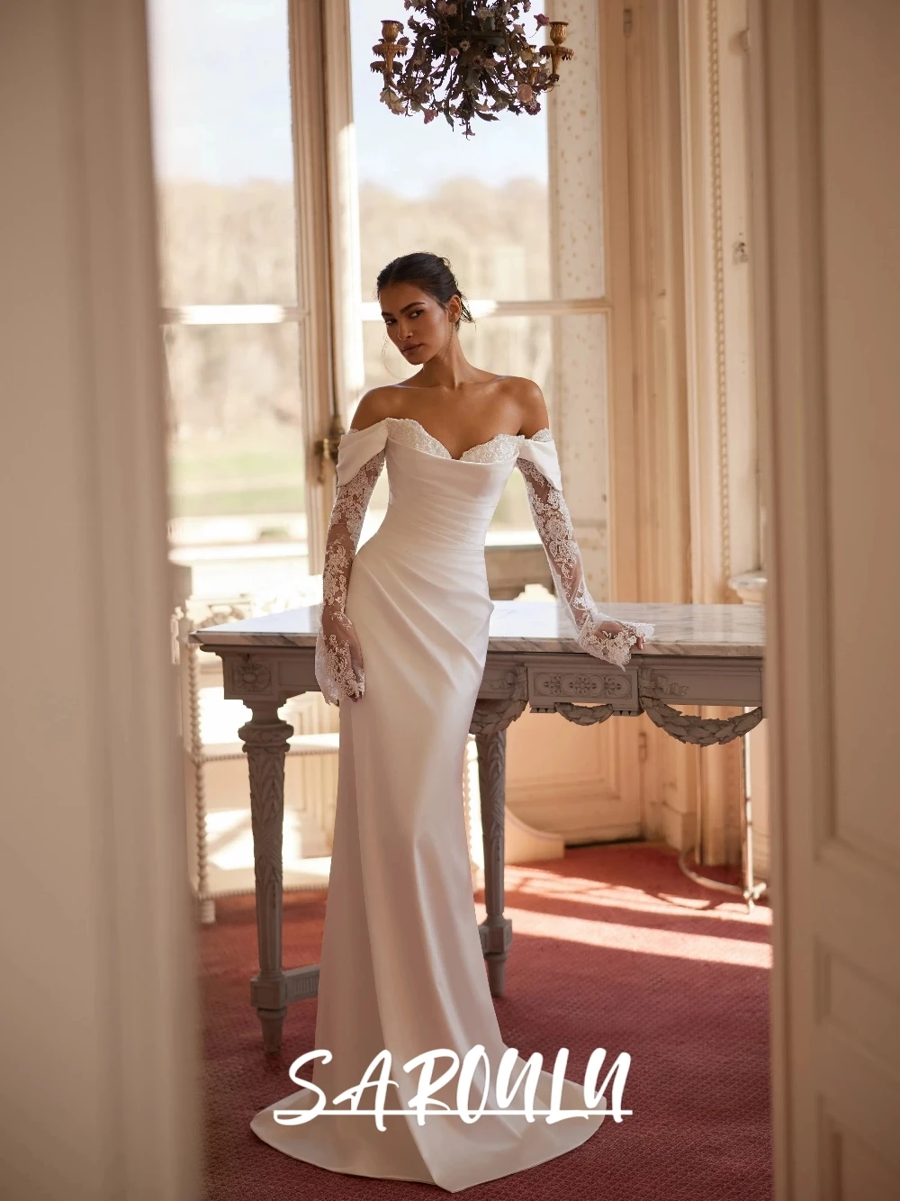 SAROULU Classy Off Shoulder Long Sleeved Wedding Dress Lace Mermaid Zipper Back Bride Wear Modern Customized Bridal Gown
SAROULU Classy Off Shoulder Long Sleeved Wedding Dress Lace Mermaid Zipper Back Bride Wear Modern Customized Bridal Gown