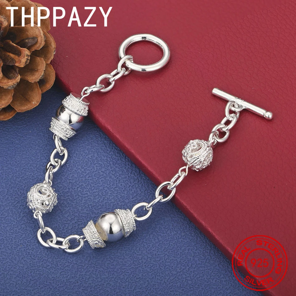 THPPAZY 8-дюймовый браслет из стерлингового серебра 925 пробы с персонализированным ажурным шариком для женщин и мужчин, модные украшения, подарок на день рождения
THPPAZY 8-дюймовый браслет из стерлингового серебра 925 пробы с персонализированным ажурным шариком для женщин и мужчин, модные украшения, подарок на день рождения