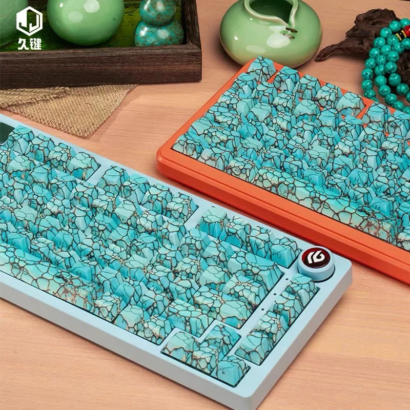 Turquoise crack-resistant ceramic keycaps with uniform light transmission on the side engraved keycaps
Turquoise crack-resistant ceramic keycaps with uniform light transmission on the side engraved keycaps