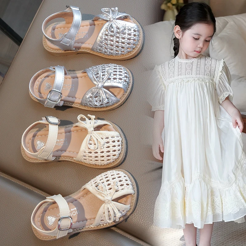 Детские плетеные сандалии с открытым носком на лето 2021, новая корейская версия, туфли принцессы с бантом для девочек и юбкой
Детские плетеные сандалии с открытым носком на лето 2021, новая корейская версия, туфли принцессы с бантом для девочек и юбкой