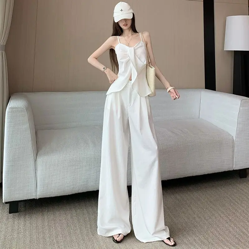 Летний модный романтический комплект из двух предметов для женщин: элитный французский стиль, дизайнерский шик, комплект с бантом, топ на бретелях + брюки с широкими штанинами
Летний модный романтический комплект из двух предметов для женщин: элитный французский стиль, дизайнерский шик, комплект с бантом, топ на бретелях + брюки с широкими штанинами