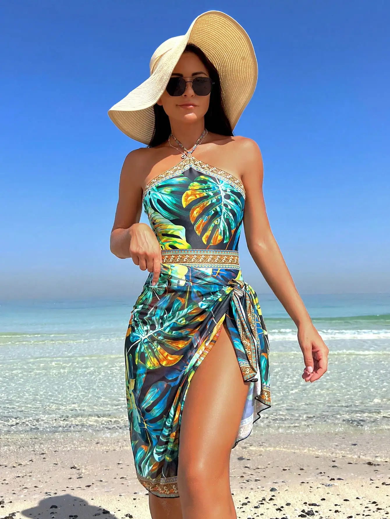 Tropical Print Halter One Piece Swimsuit With Beach Skirt
Tropical Print Halter One Piece Swimsuit With Beach Skirt