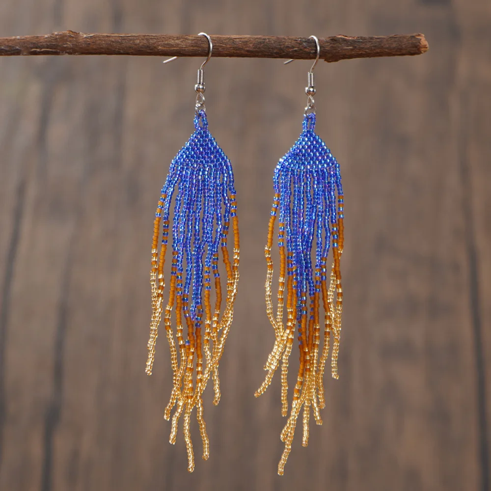 Beaded earrings Tassel Gradient color Hand knitting Alloy Originality Bohemia Tide Simple blue Female Rice bead earrings
Beaded earrings Tassel Gradient color Hand knitting Alloy Originality Bohemia Tide Simple blue Female Rice bead earrings