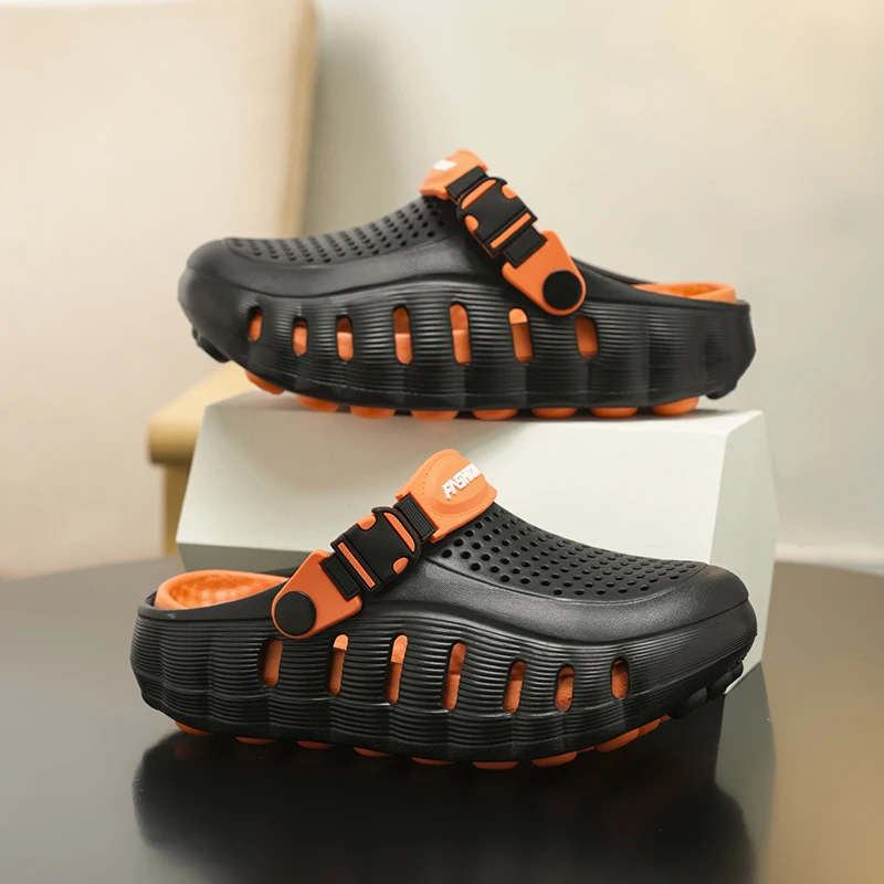 A pair of children's and teens' versatile clogs with adjustable strap and non-slip sole for school and casual wear BX-919
A pair of children's and teens' versatile clogs with adjustable strap and non-slip sole for school and casual wear BX-919