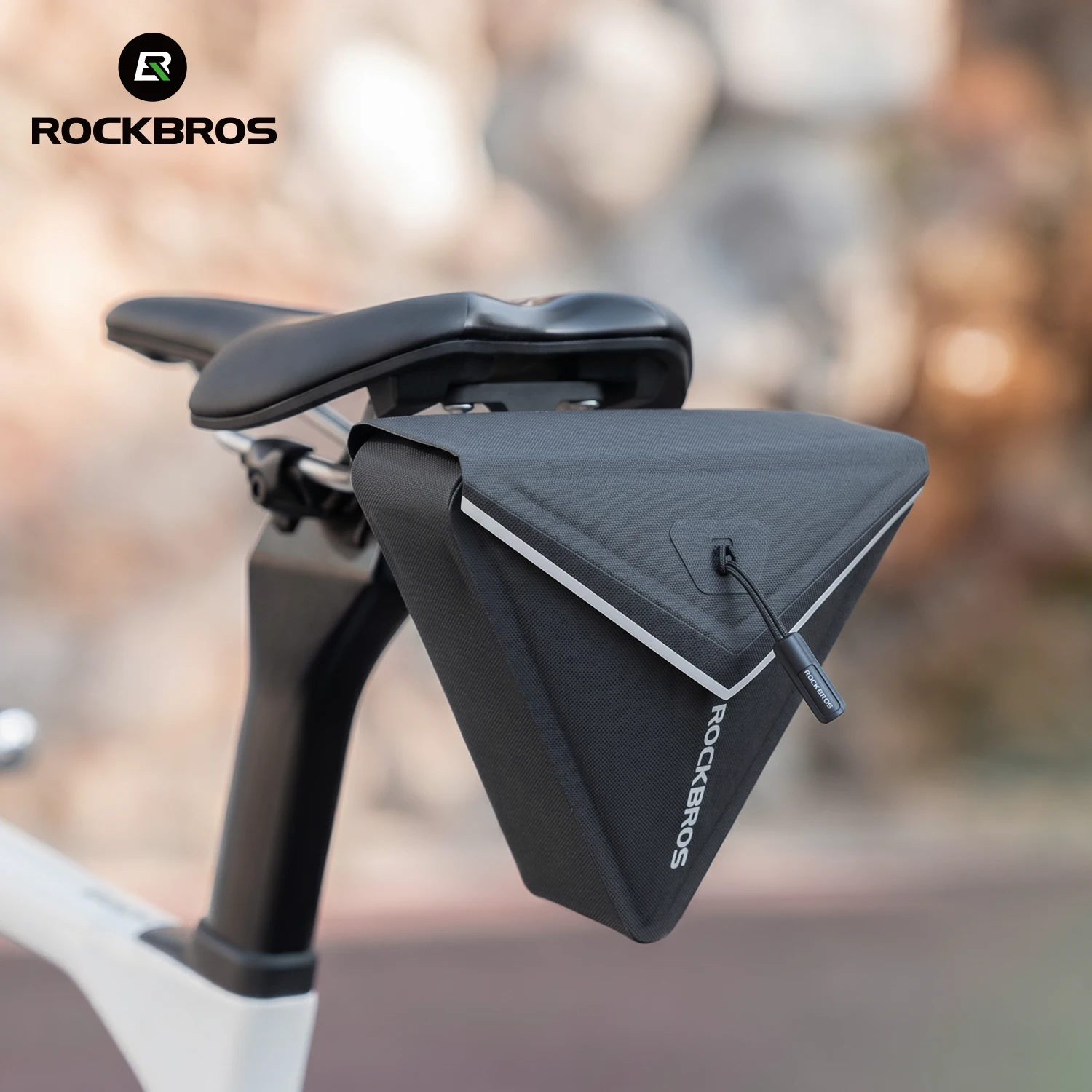 ROCKBROS Magnetic Flip-Top Bike Saddle Bag 0.6L Waterproof Cycling Saddle Tool Bag Quick Release Mount Cycling Storage Pouch
ROCKBROS Magnetic Flip-Top Bike Saddle Bag 0.6L Waterproof Cycling Saddle Tool Bag Quick Release Mount Cycling Storage Pouch