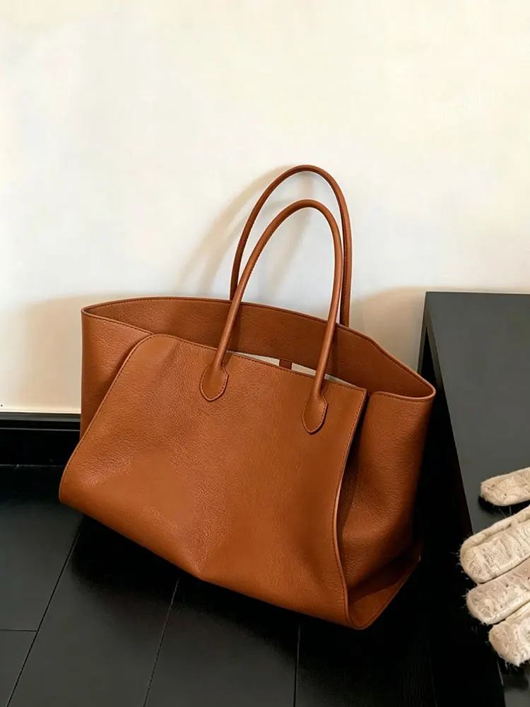 Caramel Colored Large Capacity Women's Tote Bag Luxury Minimalist High-End Sensation Elegant Single Shoulder Briefcase
Caramel Colored Large Capacity Women's Tote Bag Luxury Minimalist High-End Sensation Elegant Single Shoulder Briefcase