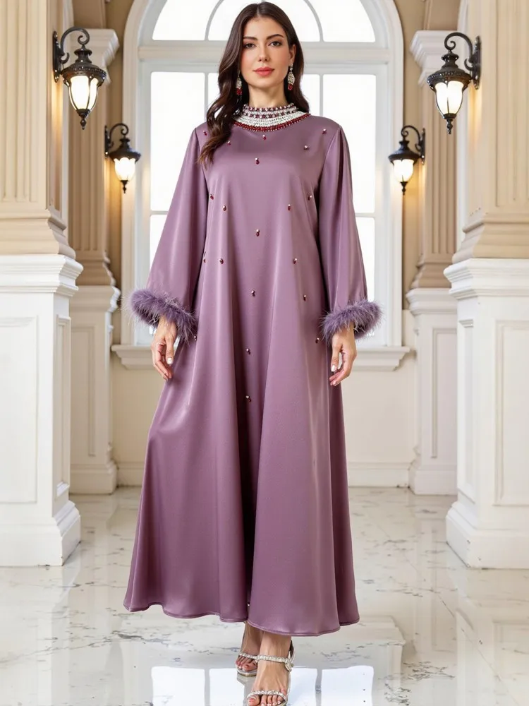 Мусульманская женская фиолетовая исламская вышитая Абая с золотыми деталями идеально подходит для официальных мероприятий на Ближнем Востоке, как ОАЕ, Саудовской Аравии
Мусульманская женская фиолетовая исламская вышитая Абая с золотыми деталями идеально подходит для официальных мероприятий на Ближнем Востоке, как ОАЕ, Саудовской Аравии