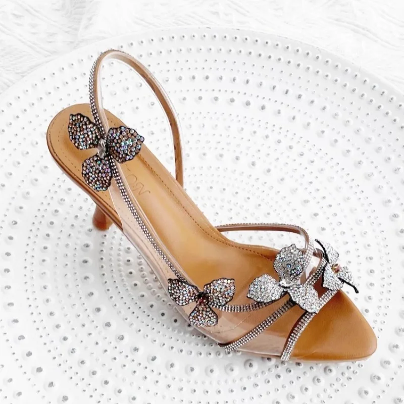 Summer new pointed rhinestone flower transparent PVC sexy fish mouth sandals thin high-heeled banquet dress versatile women shoe
Summer new pointed rhinestone flower transparent PVC sexy fish mouth sandals thin high-heeled banquet dress versatile women shoe